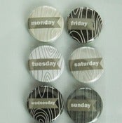 Image of woodgrain week days badge buttons
