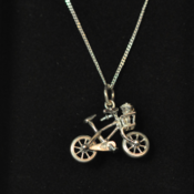 Image of Sterling silver bicycle charm with moving wheels