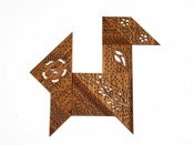 Image of Delicate 7 Piece Puzzle: An Elegant Version of a Classic Tangram