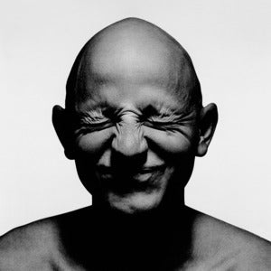 Image of Portrait of bald male smiling