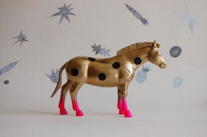 Image of polka dot zebra //golden//the strange planet