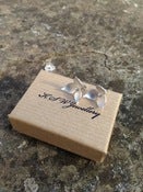 Image of Three petal flower studs