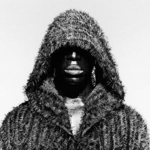 Image of Black male portrait wearing hood