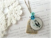 Image of Owl & Birdcage Antique Brass Necklace with Blue Flowers 
