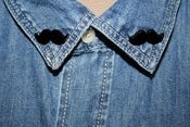 Image of 'tache