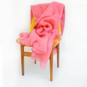Image of old lady pink mohair throw
