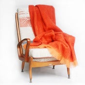 Image of tangerine mohair blanket
