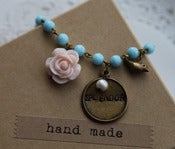 Image of Handstamped "Splendor" Charm on Vintage Aqua Blue Glass Bead Chain