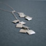 Image of suitcase necklace