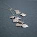 Image of suitcase necklace