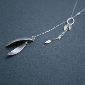 Image of falling leaves lariat necklace
