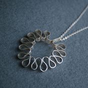Image of ruffle pendant