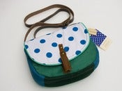 Image of --S O L D -- a small cross body bag with a white and royal blue polka dot flap