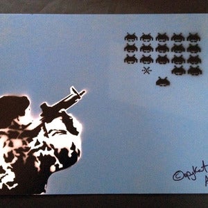 Image of INVADED TEST PRINT BY ©OPYKAT