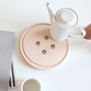 Image of snug.button