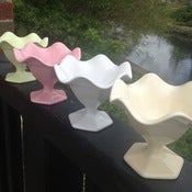 Image of small pedestal fluted bowls