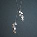 Image of suitcase necklace