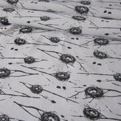Image of Nests on natural organic cotton