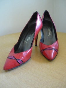 Image of red colorblock leather pumps
