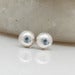Image of Sterling Silver Swiss Blue Topaz Gypsy Set Earrings -Pebble Posts
