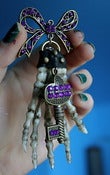 Image of Skeleton hand bow and key pendant