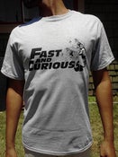 Image of The Fast And Curious T-Shirt