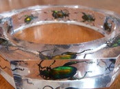 Image of Octagon resin bracelet featuring 'Fergus the Frog beetle '- green