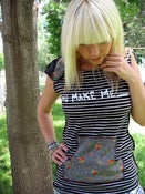 Image of black and white striped "you make me___" sleeveless t-shirt SOLD
