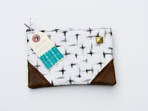 Image of -SOLD OUT- a small brushstrokes crosses print zipper purse with leather corners and a METAL zipper