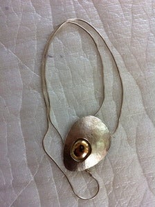 Image of Silver and gold pendant necklace