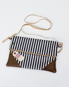 Image of -SOLD OUT- a foldover clutch in navy + cream stripe with a removable strap!