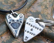 Image of Heart shaped Dog Paw Pendant "Rescued & Loved" on the back