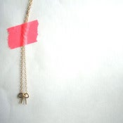 Image of bow necklace