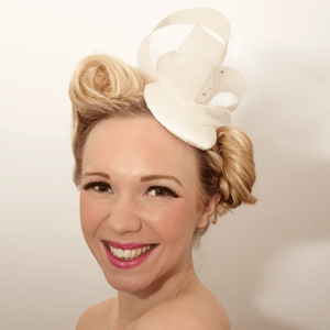 Image of Bridal fascinator with embellishment and beautiful Swarovski crystals.