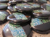 Image of Snap Neck Pixel Logo Green-Blue on Black