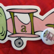 Image of one autopilot art sticker and one autopilot art button
