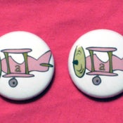 Image of 2 autopilot art buttons