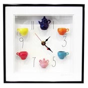 Image of Multicolor Tea Set Clock with Numbers by Carlos Silva