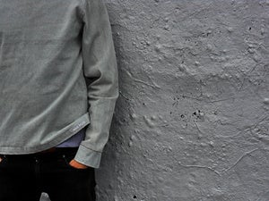 Image of light denim sweater