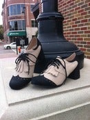 Image of oxford flap shoe
