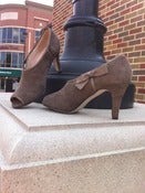 Image of suede side bow heel
