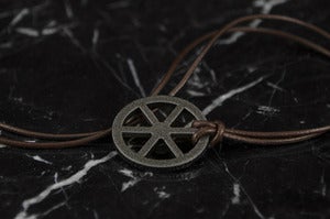 Image of Tehlu's Iron Wheel Pendant