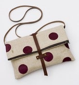 Image of foldover crossbody bag with hand cut leather polka dots (plum)
