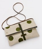 Image of foldover crossbody bag with hand cut leather polka dots (avocado)