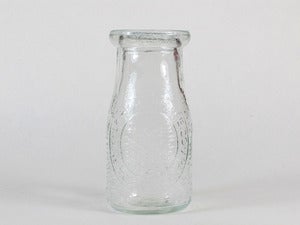 Image of Antique Recycled Glass Milk Bottles