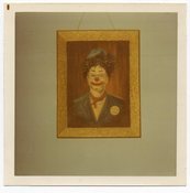Image of VINTAGE COLOR PHOTO OF A FRAMED CLOWN PICTURE ON THE WALL