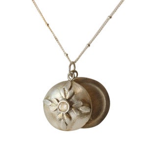 Image of Round Swing Locket