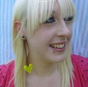 Image of Pair of long UV yellow line heart earrings