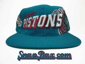 Image of Vintage Deadstock Detroit Pistons Sports Specialties Teal Block Slant Snapback hat Cap