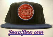 Image of Vintage Deadstock Detroit Pistons Bad Boys Era Black and Blue AJD Snapback Hat Cap